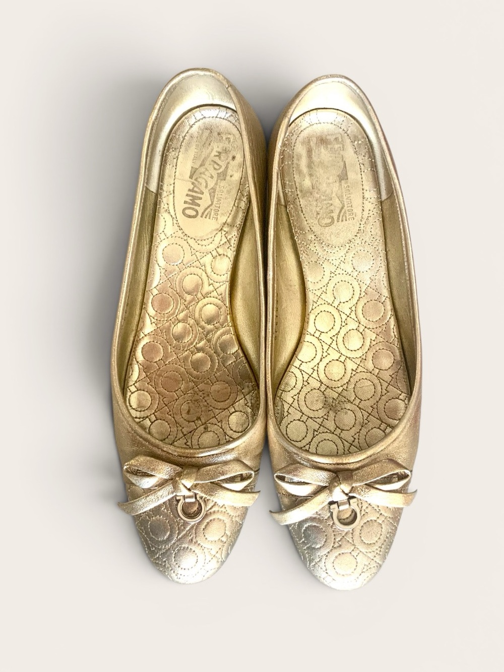 Salvatore Ferragamo Metallic Gold Bow Ballet Flats
